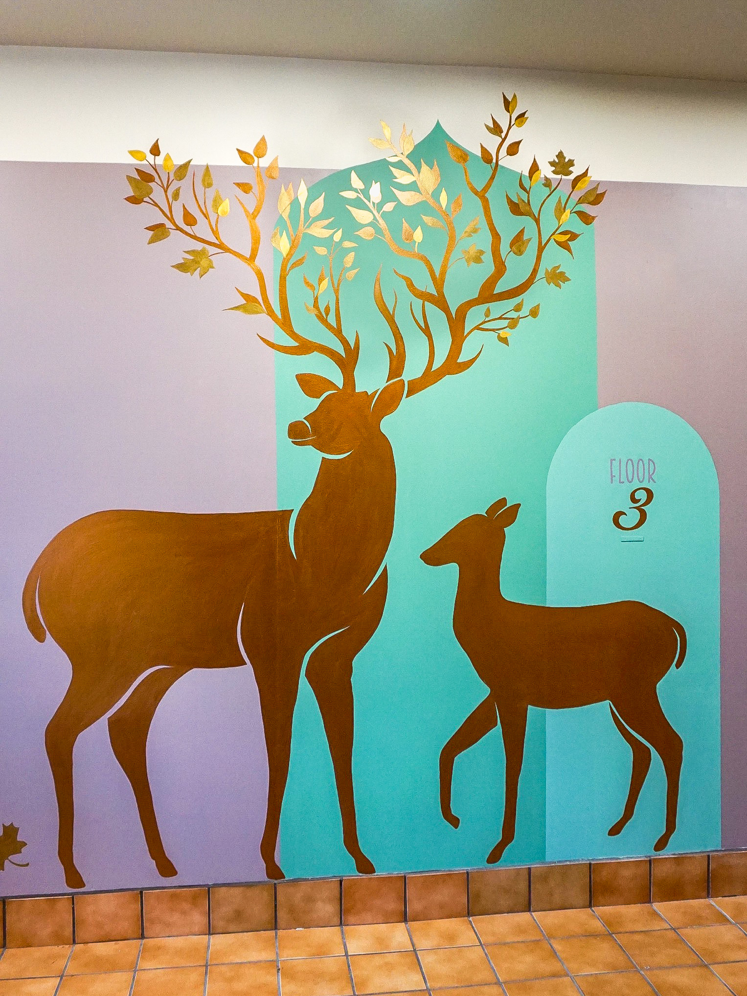 Wider view of the Grand Apartments mural.